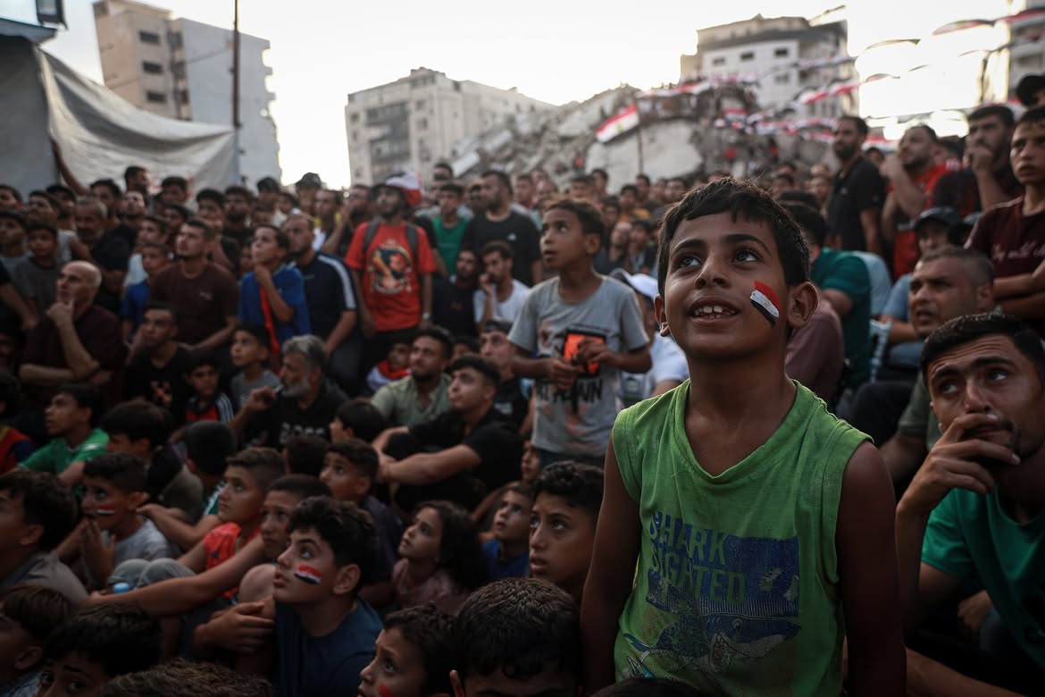 C:\Users\Sabah\Downloads\Palestinians watch a World Cup match amidst the ruins in Gaza CityGAZA CITY, GAZA, PALESTINE - J (1).jpg